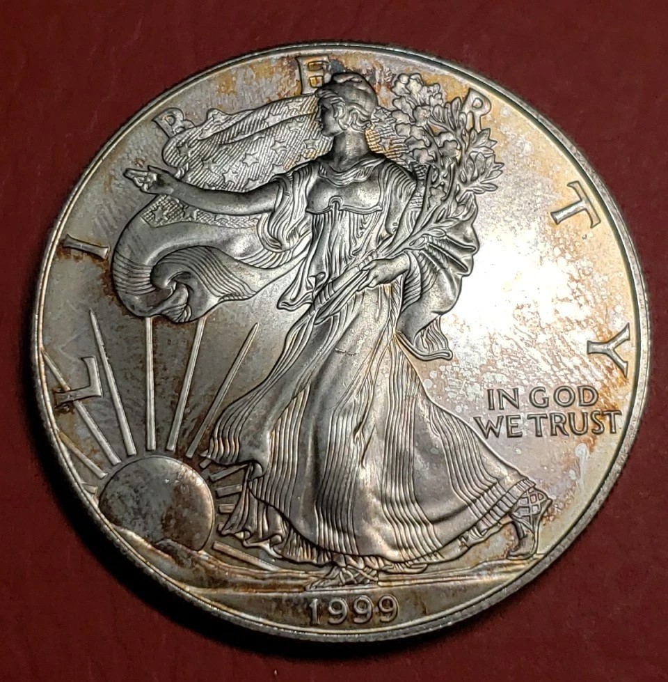 1999 Silver Eagle double strike error showing overlapping Walking Liberty impressions on obverse
