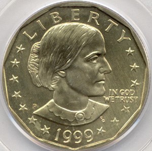 1999 SBA dollar struck on experimental manganese-brass alloy planchet showing golden tone and softer strike detail